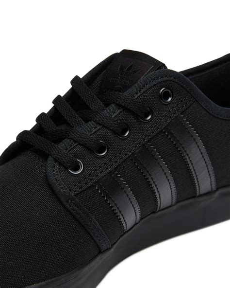 all black adidas shoes womens